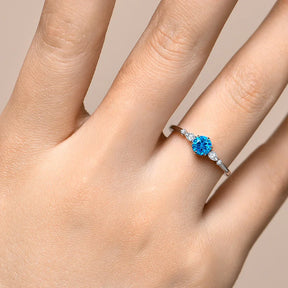 18k Gold Solitaire Ring with Blue Moissanite
